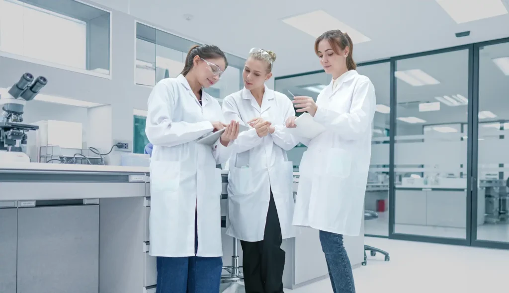 biotech research team analyzing experimental data metrics